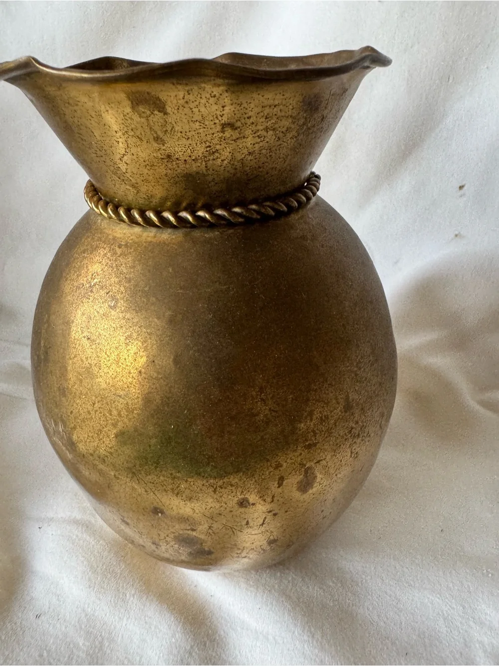 vintage solid brass vase from India featuring a distinctive ruffled rim and a de